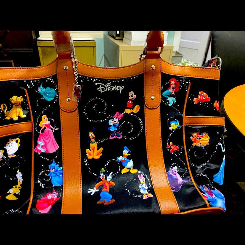 Disney tote never used , Bradford exchange